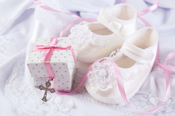 Baby shoe and cross for Christening