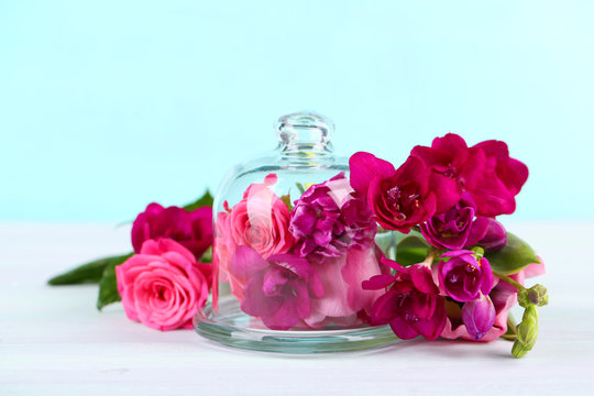 Fototapeta Beautiful composition with flowers on turquoise background