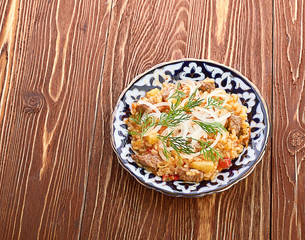 Oriental shah pilaf, pilaw, plov, rice with meat in pastry filo