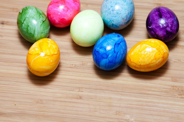 Easter egg, wooden table, colorful