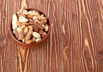 Mix nuts  on wooden  background