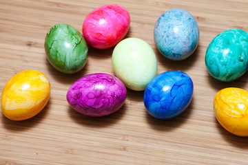 Fototapeta na wymiar Easter egg, wooden table, colorful