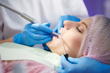 Fototapeta premium Patient girl in dentist