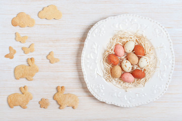 Easter chocolate eggs on a plate on the table