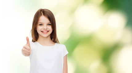 smiling little girl in white blank t-shirt