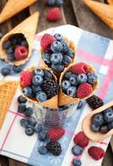 Fresh berries in waffle cone