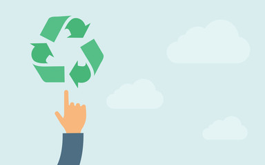 Hand pointing to recycling icon