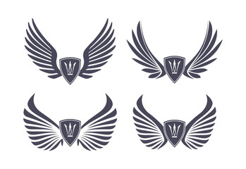 Set of 4 pair of stylish decorative vector wings with shields an