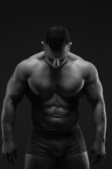 Fototapeta na wymiar Bodybuilder with great body anatomy
