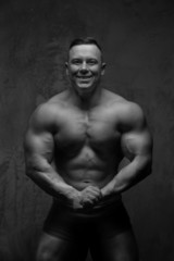 Fototapeta premium Bodybuilder with great body anatomy