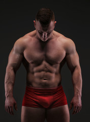 Fototapeta premium Bodybuilder with great body anatomy