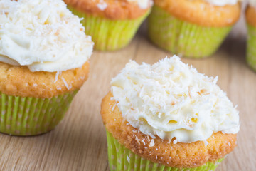 delicious homemade muffins over wooden board