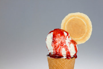 Ice cream with strawberry syrup