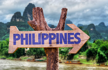 Philippines wooden sign with rural background