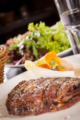 Grilled beef steak with seasoning