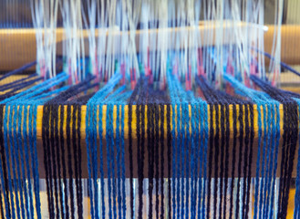 Closeup of Warp Threads at the Back of a Weaving Loom