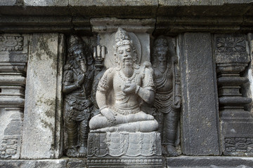 Fototapeta na wymiar Detail of carved relief at Prambanan