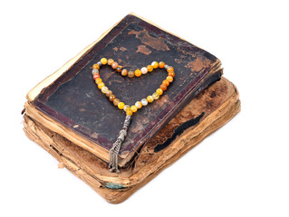Manuscript Holy Quran and Muslim prayer beads