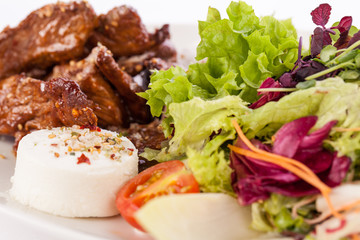 grilled beef stripes fresh salad and goat cheese
