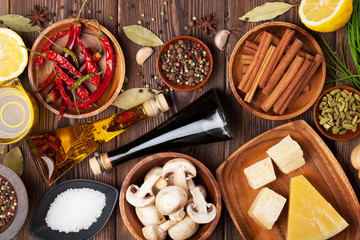Various spices on wooden background
