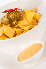 Nachos with cheese sauce and chilli pepperoni