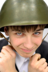 Teenager in a Military Helmet