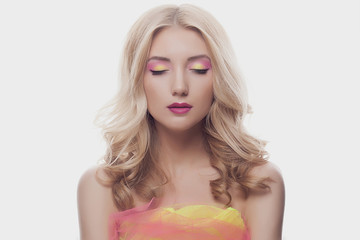 beautiful blond woman with color make-up