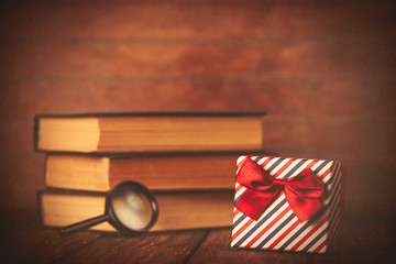 Books with loupe and gift box