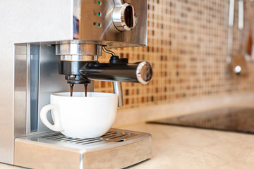 Coffee machine making espresso in a cafe