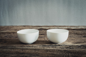 Empty little bowl on wooden tabletop