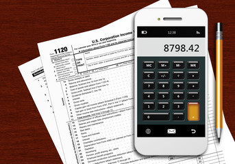 tax form 1120 with phone calculator and pencil on wooden table