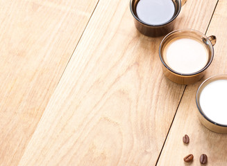 cup with coffee, milk and cocoa