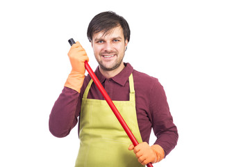Happy young man with apron and gloves ready to clean
