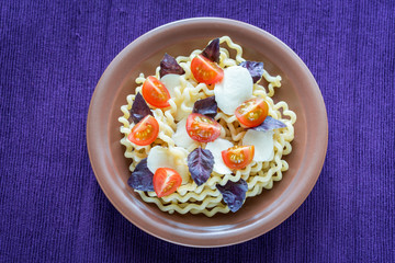 Fusilli lunghi with cheese and cherry tomatoes