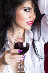 Closeup portrait of sensual brunette young woman in man's shirt