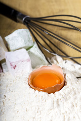 Closeup of  ingredients for baking,egg,flour and jelly