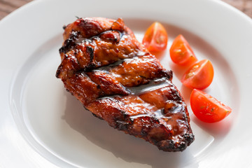Grilled chicken steak with cherry tomatoes