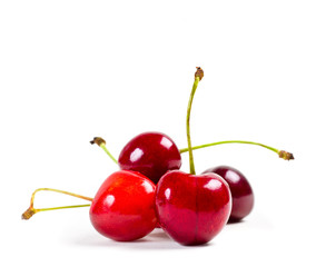 Obraz na płótnie Canvas ripe cherries on white background