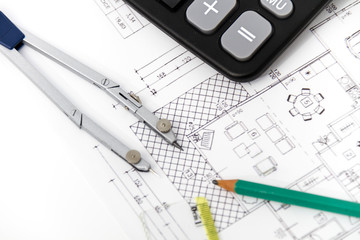 Architectural project, pair of compasses, rulers and calculator