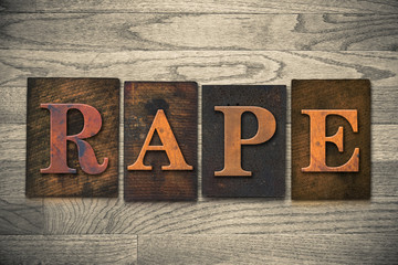 Naklejka premium Rape Concept Wooden Letterpress Theme