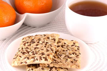 sweet cake and fruits, tea (coffee) cup and fruits