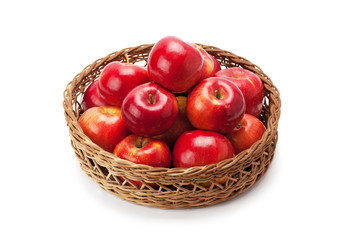 apples arranged in a basket