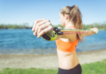 woman training with elastics