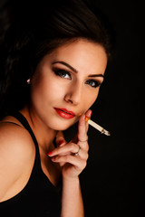 Fototapeta premium Smoking woman with a cigarette