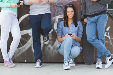 Group of teenage friends hanging out 