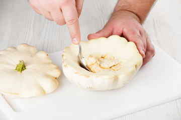 removing flesh of pumpkin
