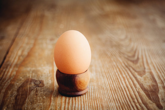 egg on wooden surface