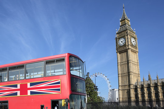 London double decker red bus with Big Ben clock tower in the background photo