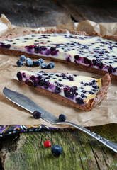 tart with blueberries and cream