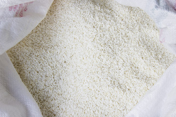 In sacks of rice from farmers in the countryside